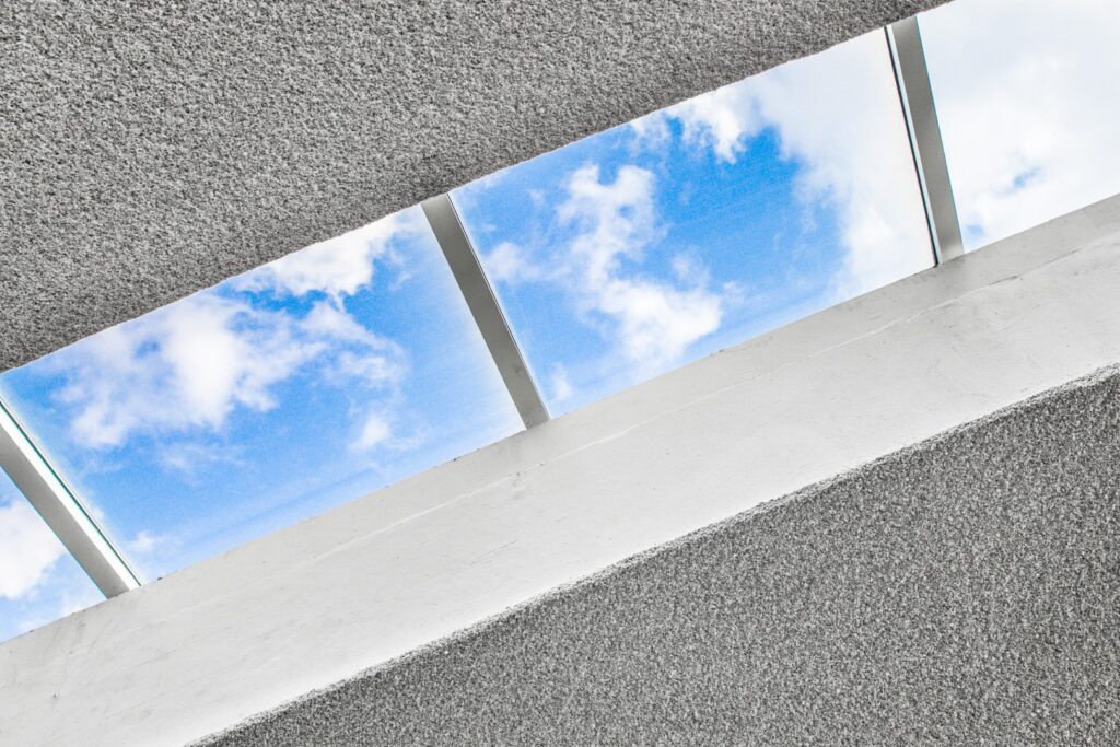 modern building skylight with blue sky and clouds